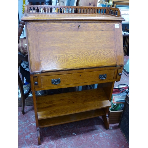 219 - A stunning small oak writing bureau with gallery back and foot rest 100 x74 cm