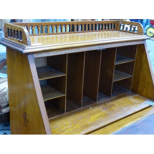 219 - A stunning small oak writing bureau with gallery back and foot rest 100 x74 cm