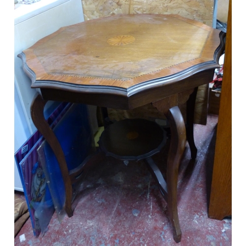 224 - An antique mahogany and inlay centre table.