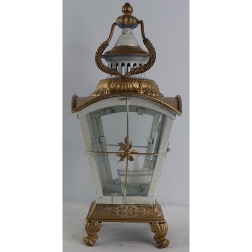 229 - A vintage metal lantern with gilt detail.