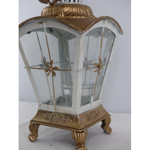 229 - A vintage metal lantern with gilt detail.