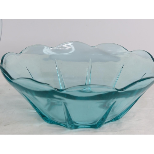 233 - A vintage blue glass vase and matching bowl.