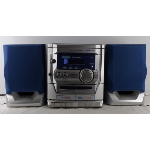 241 - A Sharp CD-XP120 double cassette hifi system with speakers.