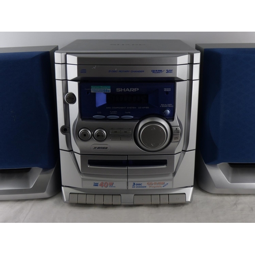 241 - A Sharp CD-XP120 double cassette hifi system with speakers.