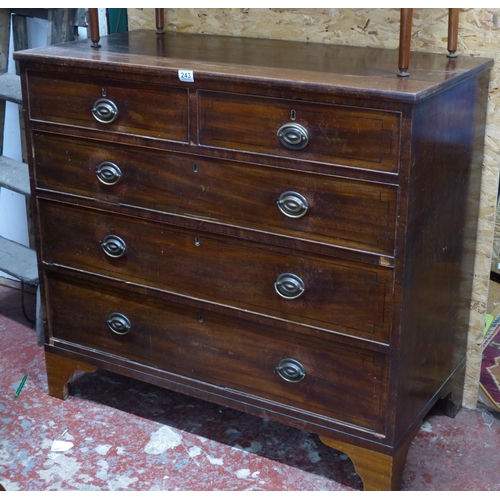 243 - A mahogany and inlay chest of five drawers.