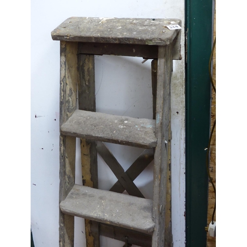 244 - A vintage folding step ladder.