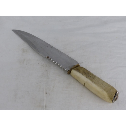 256 - A bone handled hunting knife.