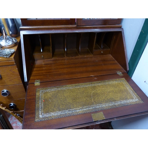 257 - A mahogany writing bureau/bookcase with astral glazed doors.