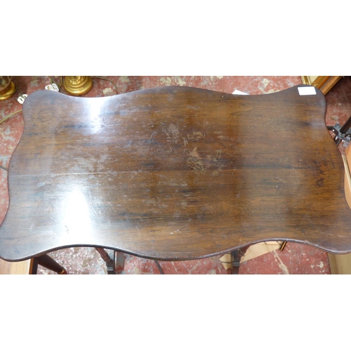 261 - An oak shaped side table signed underneath W & D.