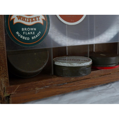 262 - A vintage shop display stand for tobacco tins.