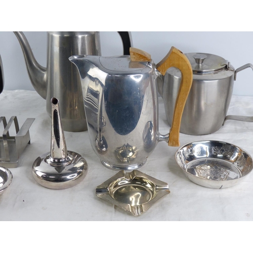 264 - A vintage stainless steel tea and coffee set including toast rack and butter dish and lots more.