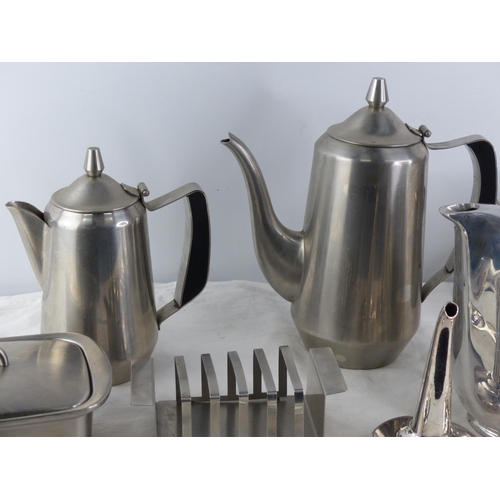 264 - A vintage stainless steel tea and coffee set including toast rack and butter dish and lots more.