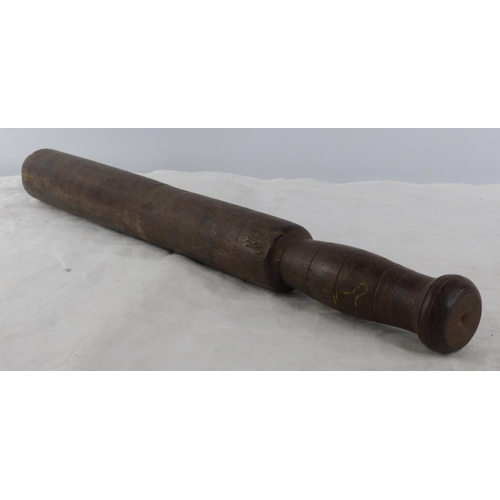 266 - A vintage wooden truncheon.