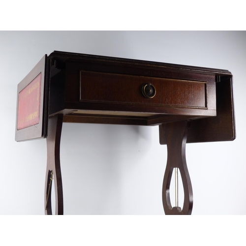 271 - A small mahogany drop leaf hall table with leather inset.