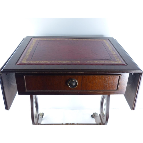 271 - A small mahogany drop leaf hall table with leather inset.