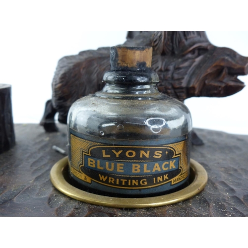 280 - An unusual antique oak style inkwell desk set with carved boar.