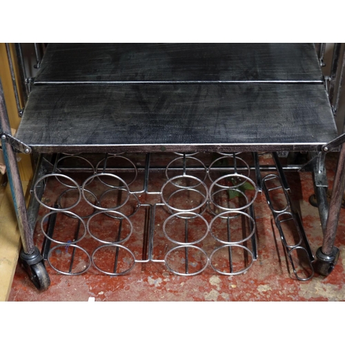 295 - A metal trolley and two wine bottle holders and more.