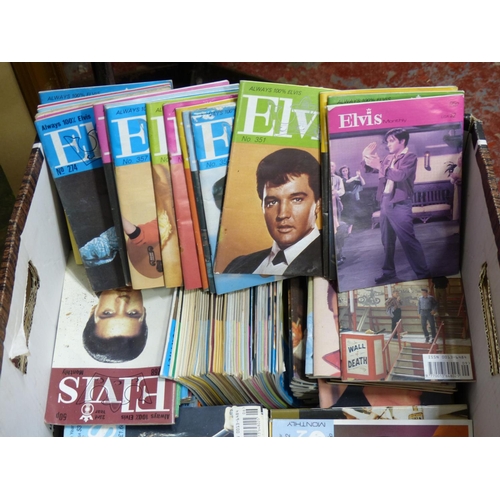 325 - A large collection of vintage Elvis magazines.