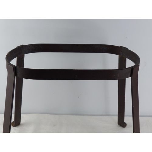 327 - An antique wrought iron stand.