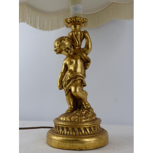 369 - A stunning chalk and gilt figurine based table lamp and shade.