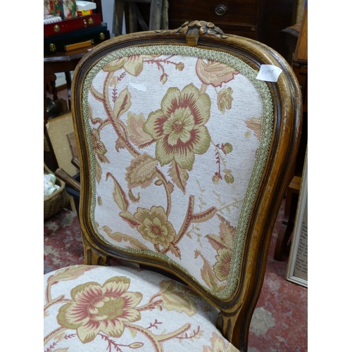 375 - An antique occasional chair.