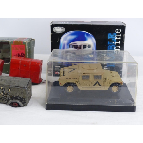 385 - A large collection of toy vehicles to include a Timpo Toys removal lorry, a cased Military Police ve... 