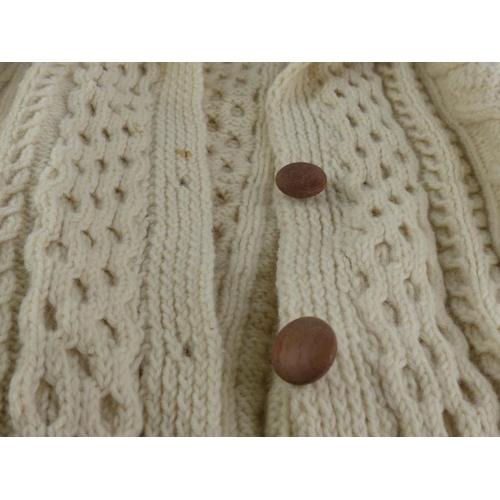 395 - An Irish handknit arran cardigan.