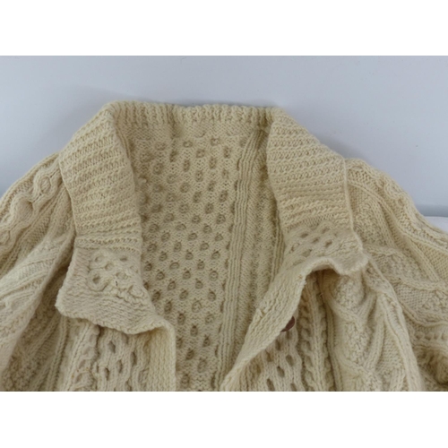 395 - An Irish handknit arran cardigan.