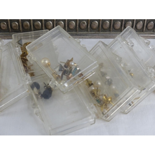 407 - A silver plated jewellery casket and a lot of cased earring sets.