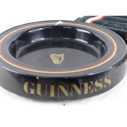 414 - A vintage 'Guinness' ashtray and Black Bottle Irish Whiskey towel bar runner.