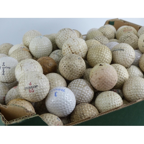 429 - A large quantity of golf balls.