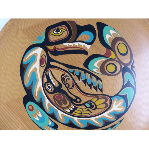 433 - A handcrafted Native American wooden plaque 'Raven and the Whole Story'.