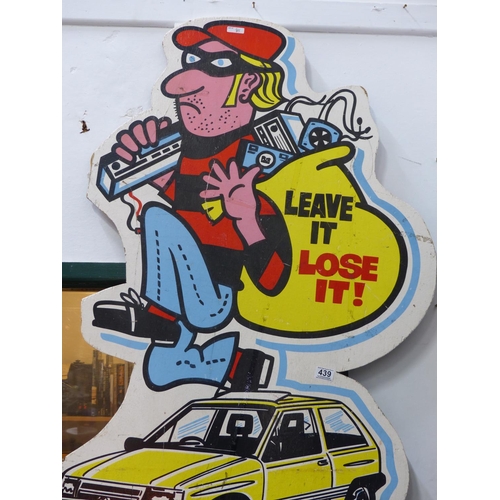 439 - A large hand painted sign 'Leave It, Lose It'.