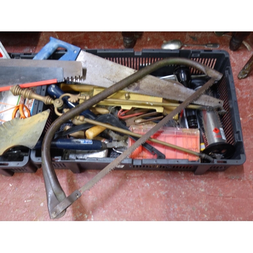 445 - A large collection of tools, hand saws etc.