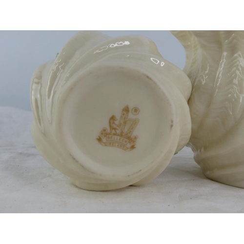 452 - Three pieces of Belleek pottery.