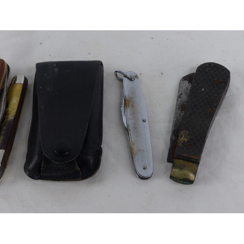 494 - A vintage Johnson Sheffield bone handled pen knife and four others, a cased Ronson lighter and two w... 