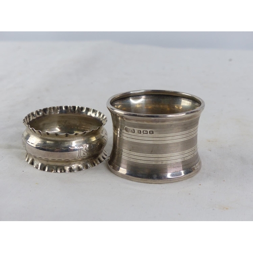 503 - A Sterling silver napkin ring and another.