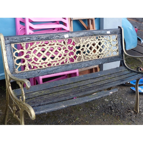 12 - A garden bench with cast iron ends for restoration.