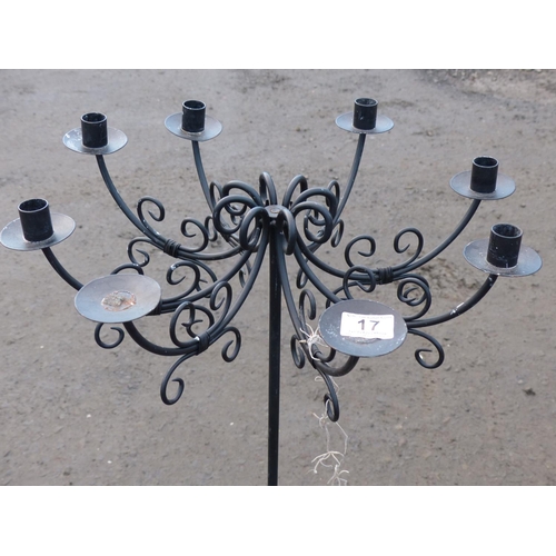 17 - A pair of 8 branch floor standing candelabras.