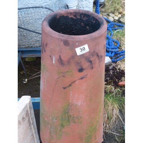 30 - A terracotta chimney pot. 1 meter tall