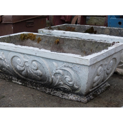 32 - A stunning pair of large decorative antique style trough planters.