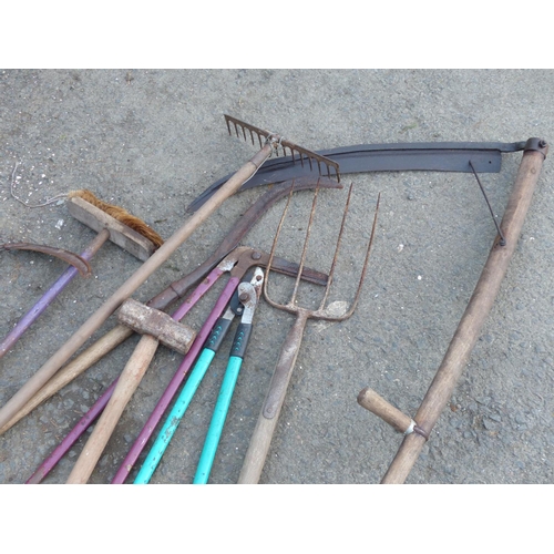 53 - An assortment of vintage garden tools etc.