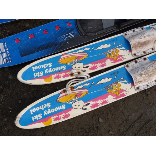 7 - A pair Snoopy Ski School water skis, a  pair of Excel HD Extreme water skis and more.