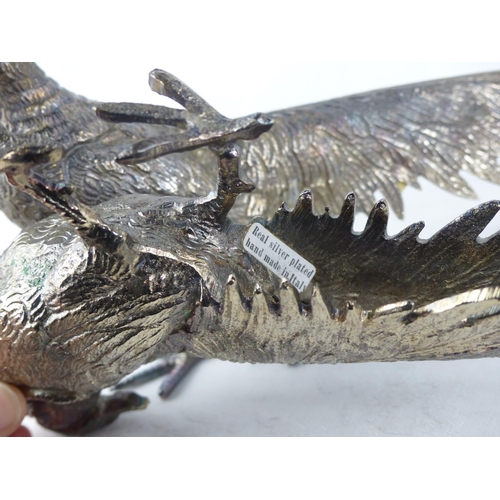 138 - A pair of Italian silver plated pheasant ornaments.