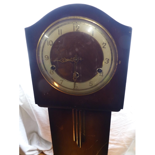 91 - A vintage grandmother clock.