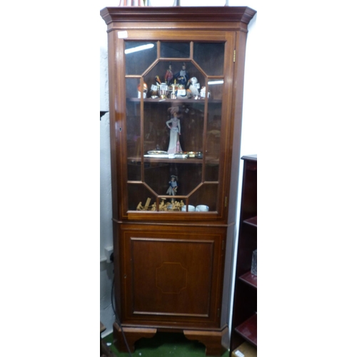 187 - An antique/ Edwardian mahogany and inlaid corner cabinet with astral glazed door.