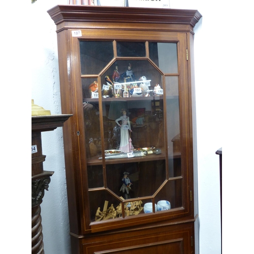 187 - An antique/ Edwardian mahogany and inlaid corner cabinet with astral glazed door.
