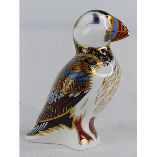 189 - A Royal Crown Derby puffin paperweight, with silver stopper.