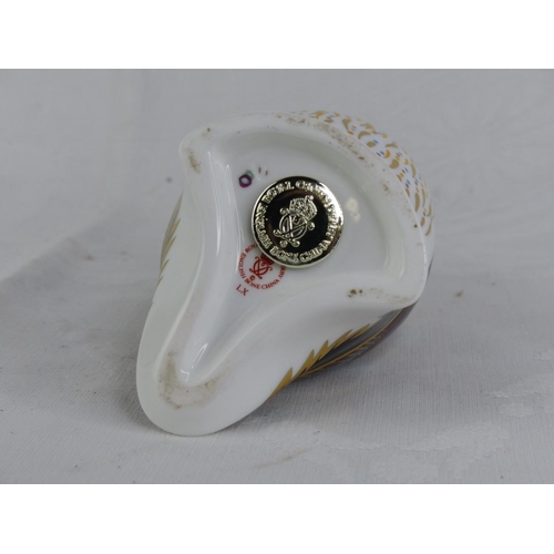 189 - A Royal Crown Derby puffin paperweight, with silver stopper.