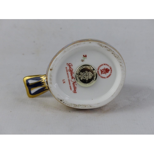 190 - A Royal Crown Derby 'Goldfinch Nesting' paperweight, with silver stopper.